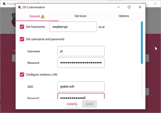 The General tab of the Raspberry Pi Imager OS Customisation window with hostname, username and password, and wireless LAN fields